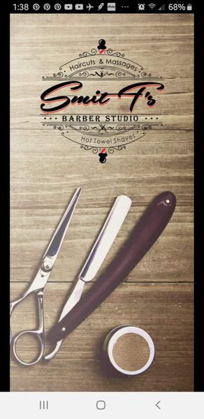 Logo for Smit T'S Barber & Beauty Parlor, LLC.